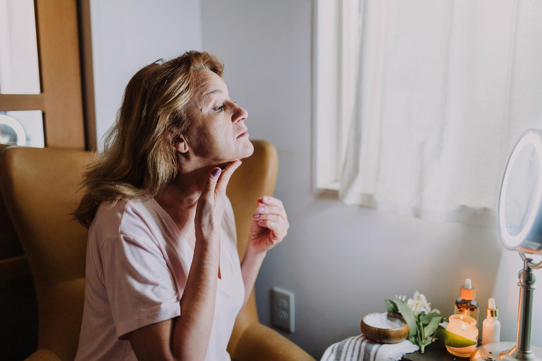 Woman with urticaria hives — choosing gentle, breathable clothing to reduce triggers